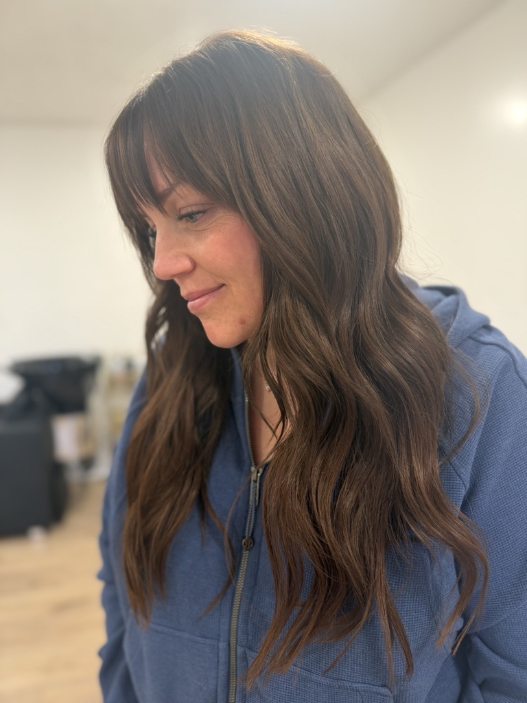 Brunette waves with bangs — cut and style